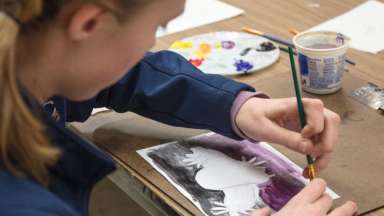 Youth girl painting picture